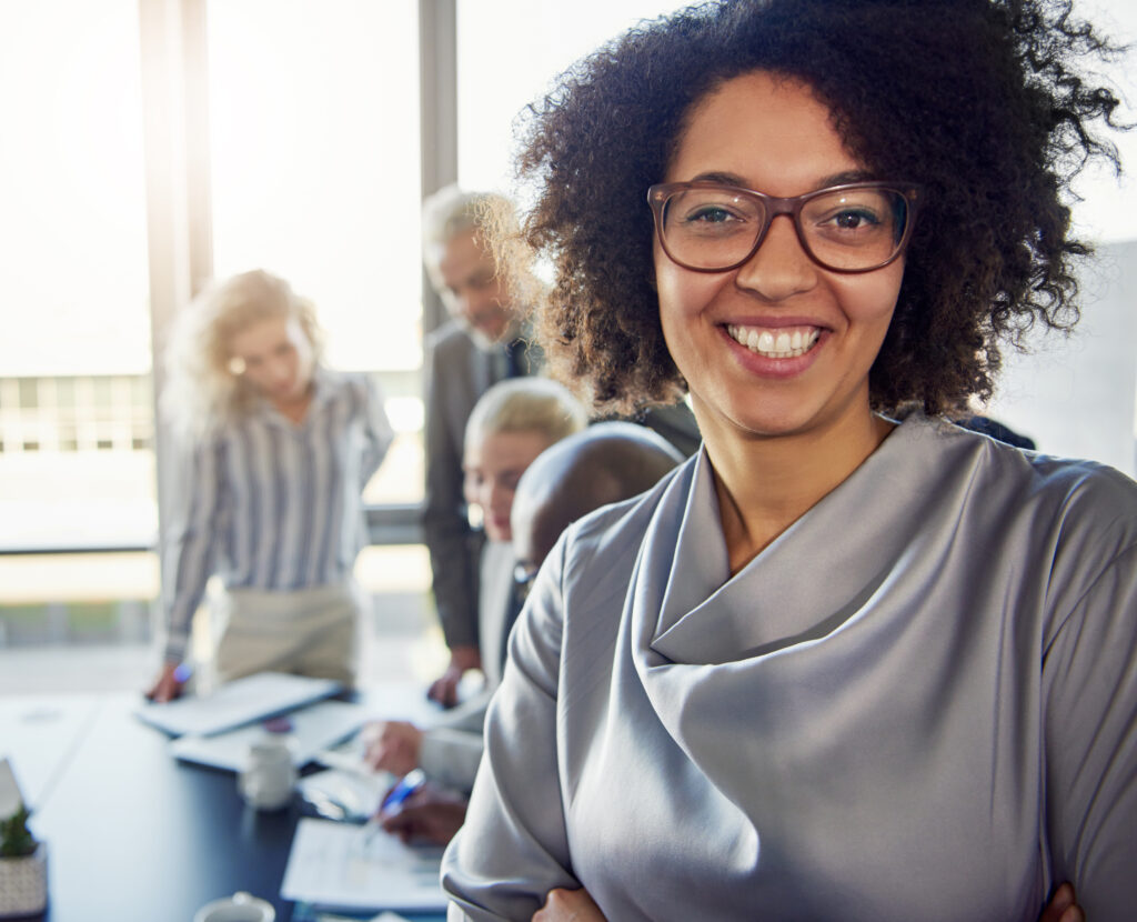 young businesswoman smiling with colleagues workin 2024 09 17 21 48 19 utc